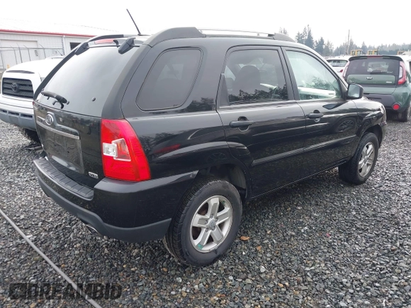 2010 Kia Sportage LX with VIN KNDKGCA33A7706645, listed as a IAAI auction lot 41387232 with 178,714 mi miles and . Bid and sale history available at carsss.com. Image 4.
