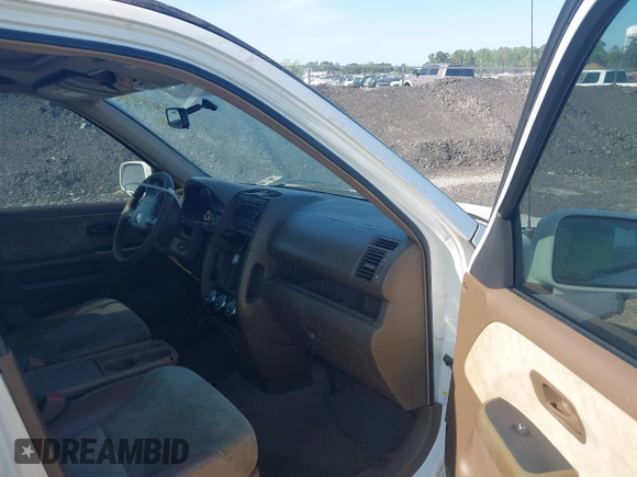 2002 Honda CR-V EX with VIN SHSRD788X2U007386, listed as a IAAI auction lot 42153700 with 212,338 mi miles. Bid and sale history available at carsss.com. Image 5.