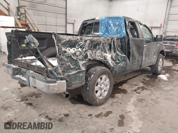2014 Ford F-150 XL with VIN 1FTFX1ET8EKE32412, listed as a IAAI auction lot 41557331 with 128,744 mi miles. Bid and sale history available at carsss.com. Image 4.