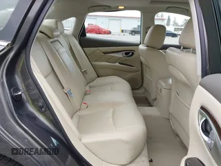2015 Infiniti Q70 with VIN JN1BY1ARXFM562111, listed as a IAAI auction lot 42473521 with 123,212 mi miles and . Bid and sale history available at DreamBid. Image 8.