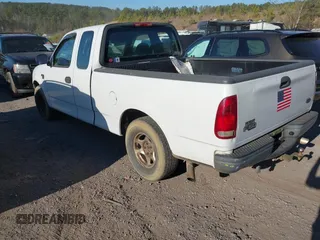 2003 Ford F-150 XL with VIN 1FTRX17W33NA66469, listed as a IAAI auction lot 41677909 with 236,619 mi miles. Bid and sale history available at carsss.com. Image 3.
