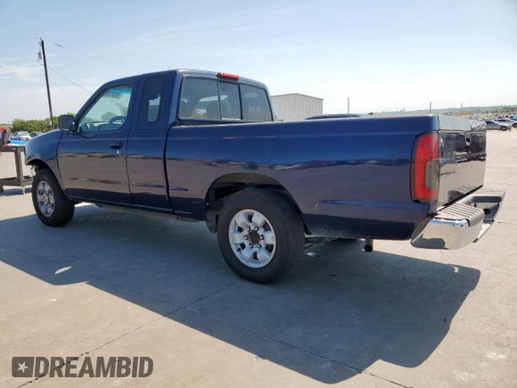1999 Nissan Frontier XE with VIN 1N6DD26S9XC307893, listed as a Copart auction lot 66045605 with 239,269 mi miles and Salvage title. Bid and sale history available at DreamBid. Image 2.