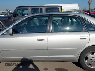 2003 Toyota Avalon XL z VIN 4T1BF28B03U321618, wystawiony jako IAAI lot #42297842 z przebiegiem 142 154 mil mil oraz . Historia ofert i sprzedaży dostępna na DreamBid. Obrazek 15.