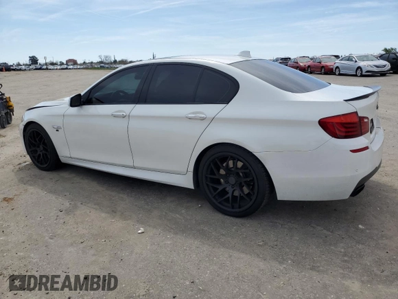 2013 BMW 5 Series 550i with VIN WBAFR9C51DDX79979, listed as a Copart auction lot 49821645 with 170,080 mi miles and Salvage Title. Bid and sale history available at DreamBid. Image 2.