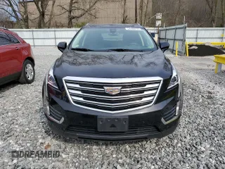 2019 Cadillac XT5 Luxury AWD z VIN 1GYKNDRS4KZ185376, wystawiony jako Copart lot #54388275 z przebiegiem 76 465 mil mil oraz Szkoda całkowita • Salvage title. Historia ofert i sprzedaży dostępna na DreamBid. Obrazek 5.
