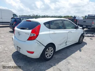 2013 Hyundai Accent GL with VIN KMHCT5AE1DU092600, listed as a IAAI auction lot 41901615 with 126,327 mi miles. Bid and sale history available at carsss.com. Image 4.