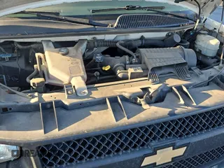 2013 Chevrolet Express Cargo with VIN 1GCWGFCA3D1147507, listed as a IAAI auction lot 42821437 with 234,091 mi miles and . Bid and sale history available at DreamBid. Image 28.