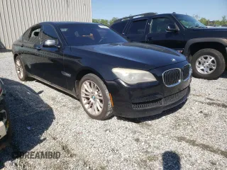 2012 BMW 7 Series 750i with VIN WBAKA8C59CDX01027, listed as a Copart auction lot 57881955 with 171,992 mi miles and Clean title. Bid and sale history available at DreamBid. Image 4.