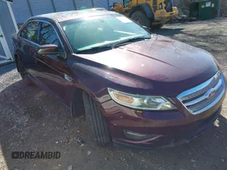 2011 Ford Taurus SEL z VIN 1FAHP2HW4BG123416, wystawiony jako IAAI lot #41850300 z przebiegiem 87 063 mil mil oraz . Historia ofert i sprzedaży dostępna na DreamBid. Obrazek 1.