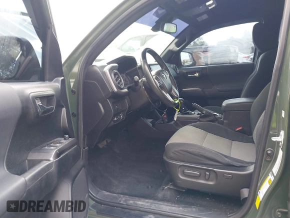 2021 Toyota Tacoma 4WD SR5 with VIN 3TMDZ5BN0MM116198, listed as a IAAI auction lot 41445815 with 59,561 mi miles. Bid and sale history available at carsss.com. Image 5.