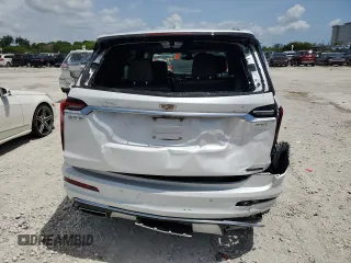 2020 Cadillac XT6 FWD Premium Luxury z VIN 1GYKPCRS7LZ235645, wystawiony jako Copart lot #58977995 z przebiegiem 42 504 mil mil oraz Nie do naprawy • Non repairable. Historia ofert i sprzedaży dostępna na DreamBid. Obrazek 6.