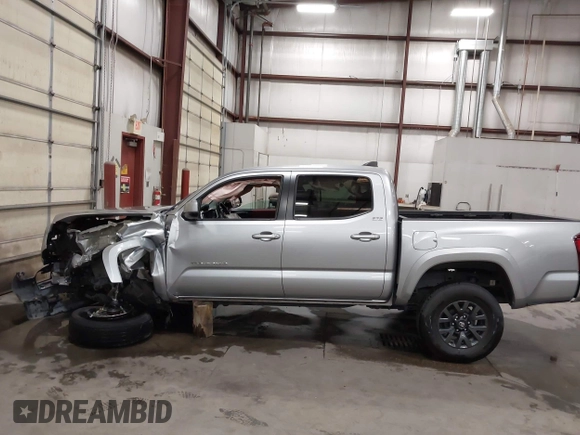 2023 Toyota Tacoma SR with VIN 3TMCZ5AN9PM604793, listed as a IAAI auction lot 42251347 with 39,741 mi miles and . Bid and sale history available at DreamBid. Image 15.