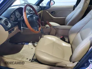 2001 Mazda MX-5 Miata with VIN JM1NB353510209224, listed as a Copart auction lot 51736955 with 103,732 mi miles and Salvage Title. Bid and sale history available at DreamBid. Image 7.