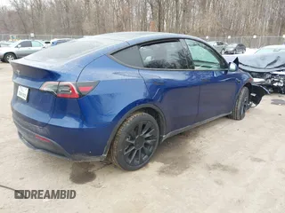 2025 Tesla Model Y Long Range with VIN 7SAYGDED9SF248370, listed as a IAAI auction lot 41336869 with 2,499 mi miles and . Bid and sale history available at DreamBid. Image 4.