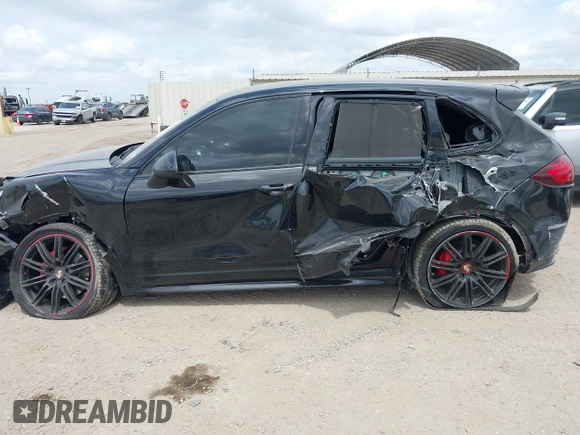 2014 Porsche Cayenne GTS with VIN WP1AD2A25ELA71350, listed as a IAAI auction lot 42031766 with 104,184 mi miles and . Bid and sale history available at DreamBid. Image 14.