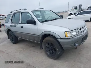 2000 Isuzu Rodeo S with VIN 4S2CK58W3Y4308219, listed as a IAAI auction lot 41939765 with 241,486 mi miles. Bid and sale history available at carsss.com. Image 1.