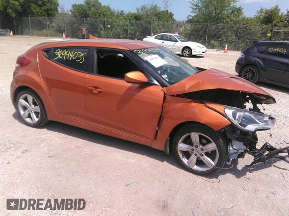 2012 Hyundai Veloster w/Gray Int z VIN KMHTC6AD7CU030176, wystawiony jako IAAI lot #36994035 z przebiegiem Nie podano mil oraz . Historia ofert i sprzedaży dostępna na DreamBid. Obrazek 1.