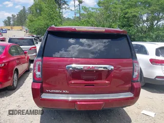 2018 GMC Yukon XL Denali z VIN 1GKS1HKJ6JR312495, wystawiony jako IAAI lot #42177446 z przebiegiem 94 268 mil mil oraz . Historia ofert i sprzedaży dostępna na DreamBid. Obrazek 16.