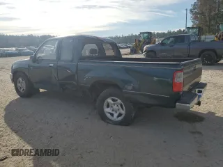 1995 Toyota T100 DX with VIN JT4VD12E1S0012010, listed as a Copart auction lot 83223154 with 253,492 mi miles and Salvage Title. Bid and sale history available at DreamBid. Image 2.