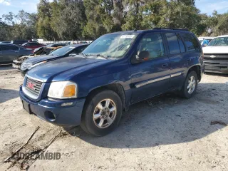 2004 GMC Envoy SLT with VIN 1GKDS13S042311327, listed as a Copart auction lot 42736995 with 235,164 mi miles and Salvage Title. Bid and sale history available at carsss.com. Image 1.