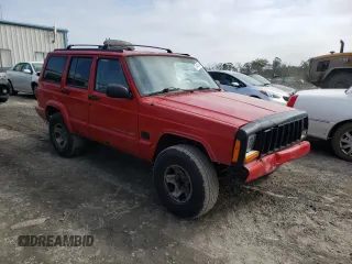1998 Jeep Cherokee Sport with VIN 1J4FJ68S5WL107496, listed as a Copart auction lot 74401404 with 225,257 mi miles and Salvage Title. Bid and sale history available at carsss.com. Image 4.