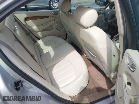 2003 Jaguar X-Type 2.5L Manual with VIN SAJEA51D33XC93300, listed as a IAAI auction lot 42048118 with 116,939 mi miles and . Bid and sale history available at DreamBid. Image 8.