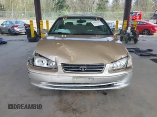2001 Toyota Camry LE z VIN JT2BF28K110320365, wystawiony jako IAAI lot #41993343 z przebiegiem 211 458 mil mil oraz . Historia ofert i sprzedaży dostępna na DreamBid. Obrazek 12.