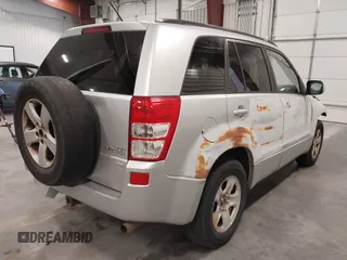 2006 Suzuki Grand Vitara XSport with VIN JS3TD944264101899, listed as a IAAI auction lot 42139363 with 153,508 mi miles and . Bid and sale history available at DreamBid. Image 4.