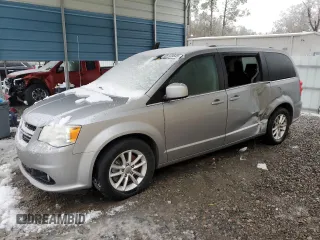 2019 Dodge Grand Caravan SXT with VIN 2C4RDGCG1KR595981, listed as a Copart auction lot 88133645 with 104,852 mi miles and Salvage Title. Bid and sale history available at DreamBid. Image 1.