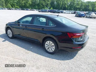2019 Volkswagen Jetta S z VIN 3VWC57BU6KM084104, wystawiony jako IAAI lot #42423409 z przebiegiem 115 398 mil mil oraz . Historia ofert i sprzedaży dostępna na DreamBid. Obrazek 3.
