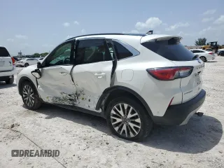 2020 Ford Escape Titanium Hybrid with VIN 1FMCU9DZ0LUB95931, listed as a Copart auction lot 59876815 with 67,932 mi miles and Salvage title. Bid and sale history available at DreamBid. Image 2.