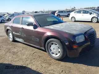 2005 Chrysler 300 with VIN 2C3JA43R05H539602, listed as a IAAI auction lot 41335192 with 1 mi miles. Bid and sale history available at carsss.com. Image 1.