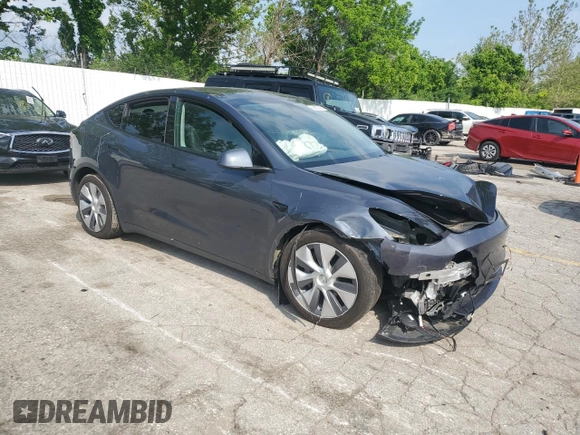 2023 Tesla Model Y Long Range z VIN 7SAYGDEE2PA041350, wystawiony jako Copart lot #56657005 z przebiegiem 25 090 mil mil oraz Szkoda całkowita • Salvage title. Historia ofert i sprzedaży dostępna na DreamBid. Obrazek 4.