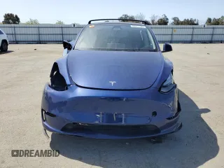 2023 Tesla Model Y Long Range with VIN 7SAYGAEE8PF927092, listed as a Copart auction lot 53917185 with 17,639 mi miles and Salvage Title. Bid and sale history available at DreamBid. Image 5.