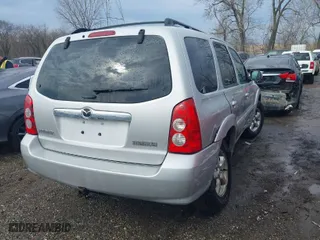 2005 Mazda Tribute s with VIN 4F2YZ96125KM10503, listed as a IAAI auction lot 41659255 with 68,855 mi miles. Bid and sale history available at carsss.com. Image 4.