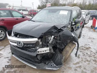 2021 Honda Pilot Touring 8-Passenger z VIN 5FNYF6H94MB091384, wystawiony jako IAAI lot #41567070 z przebiegiem 78 330 mil mil oraz . Historia ofert i sprzedaży dostępna na DreamBid. Obrazek 2.