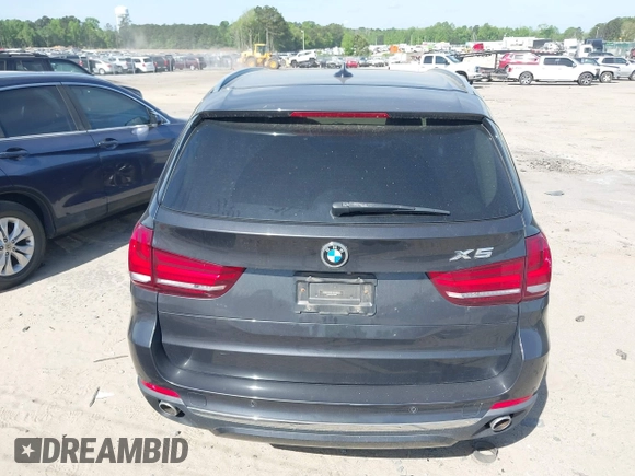 2014 BMW X5 xDrive35d with VIN 5UXKS4C57E0J93982, listed as a IAAI auction lot 42085173 with 169,908 mi miles. Bid and sale history available at carsss.com. Image 22.