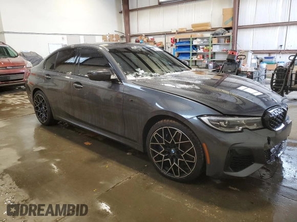 2022 BMW 3 Series M340i xDrive with VIN WBA5U9C02NFL66019, listed as a Copart auction lot 86330044 with 42,394 mi miles and Salvage Title. Bid and sale history available at DreamBid. Image 4.