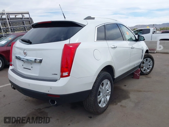 2012 Cadillac SRX Luxury Collection with VIN 3GYFNAE34CS606963, listed as a IAAI auction lot 41815097 with Not Provided miles and . Bid and sale history available at carsss.com. Image 4.
