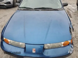 2000 Saturn SL with VIN 1G8ZK5276YZ238736, listed as a Copart auction lot 80936244 with 94,560 mi miles and Salvage title. Bid and sale history available at DreamBid. Image 11.
