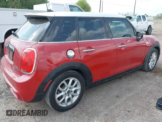 2016 MINI Cooper Hardtop 4 Door S with VIN WMWXU3C56G2D30140, listed as a IAAI auction lot 41883406 with 120,705 mi miles. Bid and sale history available at carsss.com. Image 4.