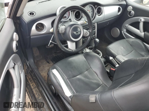 2005 MINI Hardtop with VIN WMWRC335X5TJ70165, listed as a Copart auction lot 53918445 with 145,572 mi miles and Salvage title. Bid and sale history available at DreamBid. Image 8.