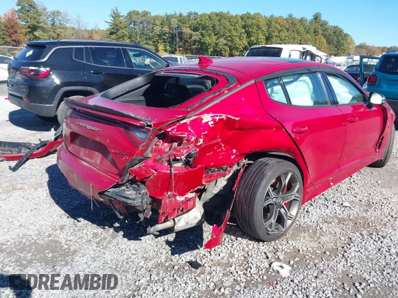 2018 Kia Stinger GT2 with VIN KNAE55LC0J6019590, listed as a IAAI auction lot 40627501 with 90,021 mi miles. Bid and sale history available at carsss.com. Image 4.