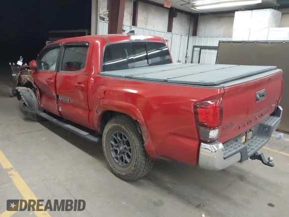 2018 Toyota Tacoma SR with VIN 3TMCZ5AN0JM166978, listed as a IAAI auction lot 41936143 with 129,674 mi miles. Bid and sale history available at carsss.com. Image 3.