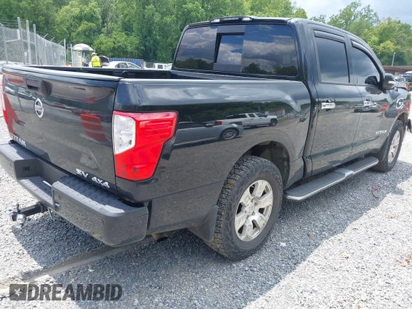 2017 Nissan Titan SV with VIN 1N6AA1E58HN542504, listed as a IAAI auction lot 42564921 with 161,555 mi miles and . Bid and sale history available at DreamBid. Image 4.