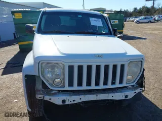 2011 Jeep Liberty Sport with VIN 1J4PP2GK4BW580280, listed as a IAAI auction lot 41482961 with 165,130 mi miles. Bid and sale history available at carsss.com. Image 13.