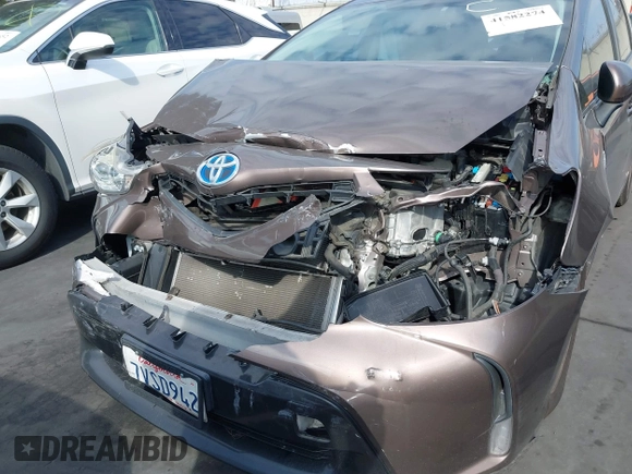 2015 Toyota Prius Two with VIN JTDZN3EU4FJ040526, listed as a IAAI auction lot 41582274 with 137,797 mi miles and . Bid and sale history available at DreamBid. Image 6.