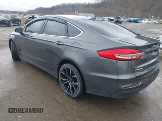 2019 Ford Fusion SEL with VIN 3FA6P0CD6KR141832, listed as a IAAI auction lot 41800102 with 142,282 mi miles and . Bid and sale history available at DreamBid. Image 3.