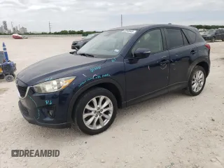 2015 Mazda CX-5 Grand Touring with VIN JM3KE4DY1F0480406, listed as a Copart auction lot 52349945 with 166,515 mi miles and Salvage Title. Bid and sale history available at carsss.com. Image 1.