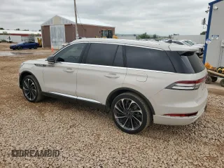 2021 Lincoln Aviator Reserve z VIN 5LM5J7XCXMGL19293, wystawiony jako Copart lot #64761565 z przebiegiem 61 614 mil mil oraz Szkoda całkowita • Salvage title. Historia ofert i sprzedaży dostępna na DreamBid. Obrazek 2.